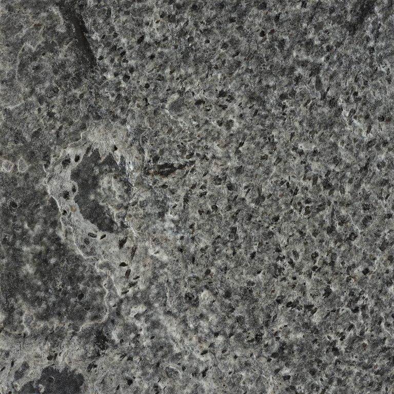 Color/Finish variation image for Quartzite - Amazon. The surface finish shown is brushed. Dominant colors shown are green and gray; with black and brown secondaries. Exhibits 