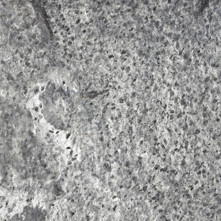 Color/Finish variation image for Amazon Quartzite. The surface finish shown is brushed. The dominant color shown is gray; with beige, green, purple and white secondaries. Exhibits 