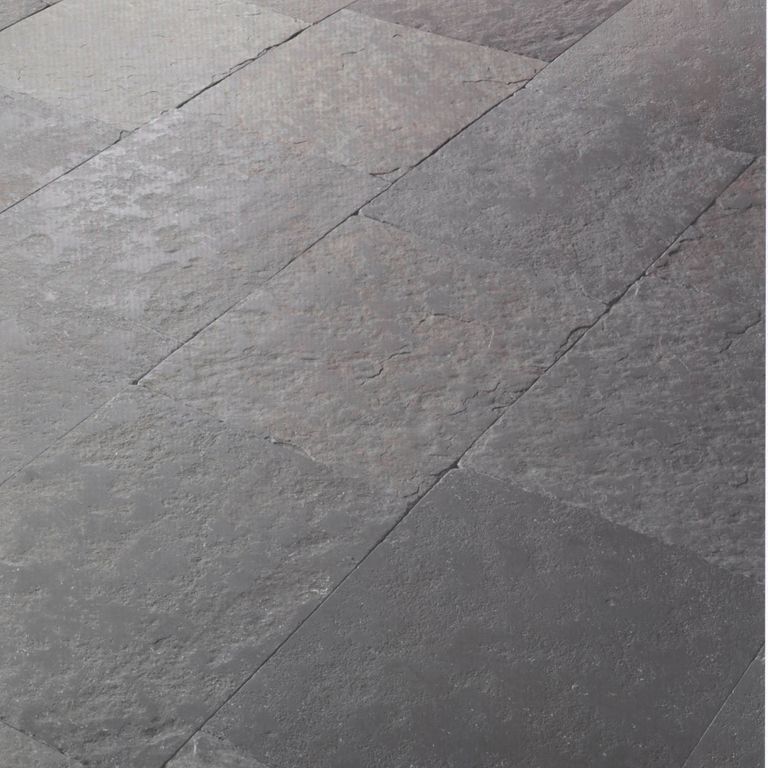 The image shows this material being used in an interior floor application.