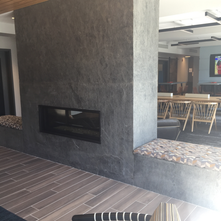 Application image for Quartzite - Amazon. Dominant colors shown are brown and gray. The color mix creates a warm feeling.