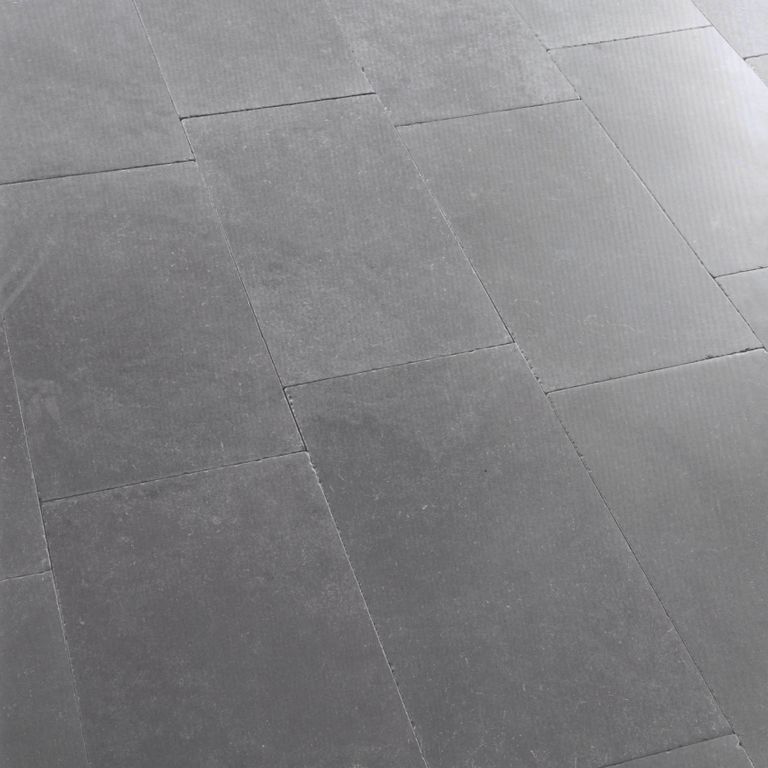 The image shows this material being used in an interior floor application.