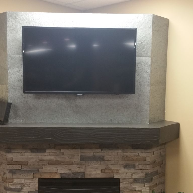 Application image for Quartzite - Amazon. The image shows this material being used in an architectural elements application. Dominant colors shown are beige and tan. The color mix creates a warm feeling.