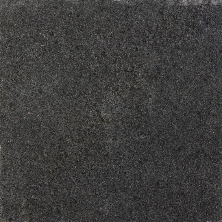 Color/Finish variation image for Metal Frost Quartzite. The surface finish shown is waterjet. Dominant colors shown are black, brown and gray. The color mix creates a cool feeling. Solid, speckled and cloudy color patterns.