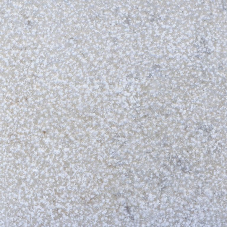 Color/Finish variation image for Amaza Limestone. The surface finish shown is a combination of brushed and bush hammered. Dominant colors shown are blue, gray and white; with a beige secondary. The color mix creates a cool feeling. Cloudy and coarse speckled color patterns.