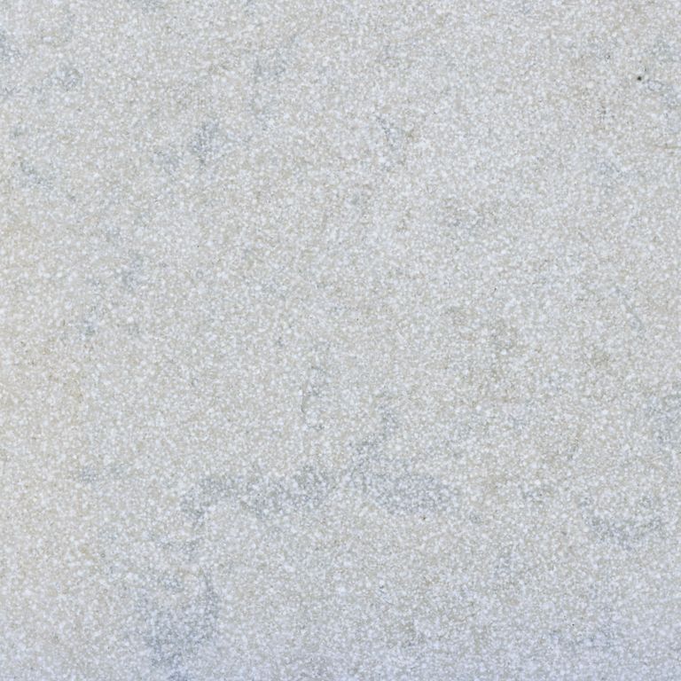 Color/Finish variation image for Amaza Limestone. The surface finish shown is a combination of brushed and sand blasted. Dominant colors shown are blue, gray and white. The color mix creates a cool feeling. Fine speckled and cloudy color patterns.