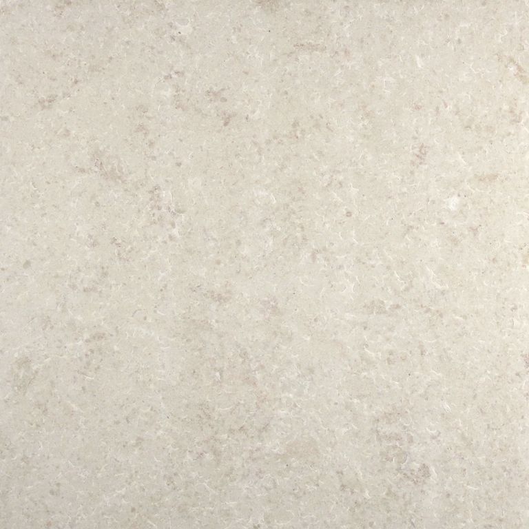 Close-up image for Classimo Beige Limestone. The surface finishes shown are brushed and flamed. Dominant colors shown are beige and cream; with gray, white and tan secondaries. Exhibits 