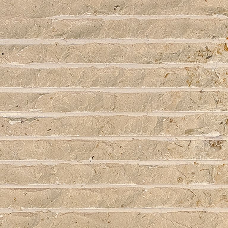 Color/Finish variation image for Cream Limestone. The surface finish shown is chiseled. Dominant colors shown are beige and tan; with brown, orange/rust and cream secondaries. Exhibits 
