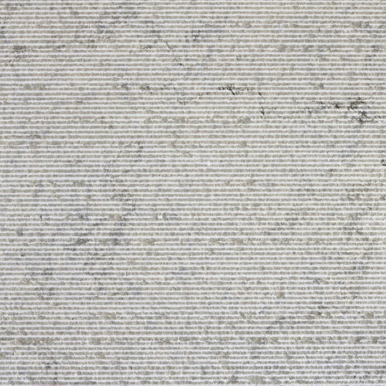 Color/Finish variation image for Sky Prima Limestone. The surface finish shown is chiseled. The dominant color shown is gray; with beige and white secondaries. The color mix creates a cool feeling. Regular, linear and cloudy color patterns.