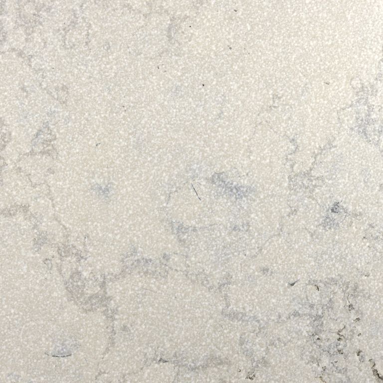 Color/Finish variation image for Sky Prima Limestone. The surface finishes shown are brushed and sand blasted. Dominant colors shown are beige, gray and cream; with white and tan secondaries. Exhibits 