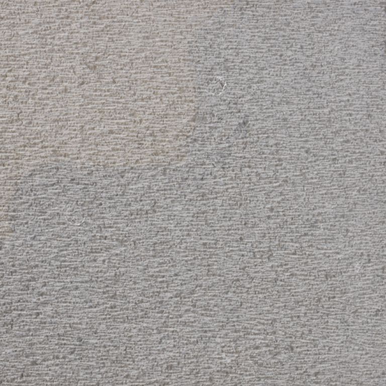 Color/Finish variation image for Portuguese Amaza Estrema Limestone. The surface finish shown is adze. The dominant color shown is gray; with beige and purple secondaries. The color mix creates a cool feeling. Regular color pattern.