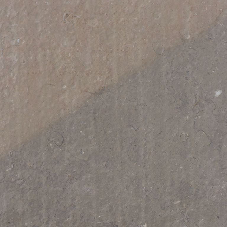 Color/Finish variation image for Limestone - Portuguese Amaza Estrema. The surface finishes shown are brushed and flamed. Dominant colors shown are gray and purple; with a brown secondary. The color mix creates a cool feeling. Regular color pattern. Contains mineral inclusions.