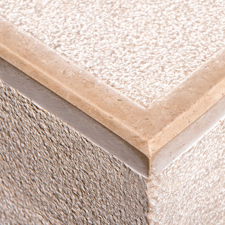 Application image for Limestone - Portuguese Amaza Estrema. The image shows this material being used in an architectural elements application. This is a building and landscape stone for indoor and outdoor commercial and residential applications. Suitable for general use, freeze-thaw conditions, low heat absorption surfaces, high traffic areas and high heel compatibilty situations. Moderate to higher on the price spectrum.