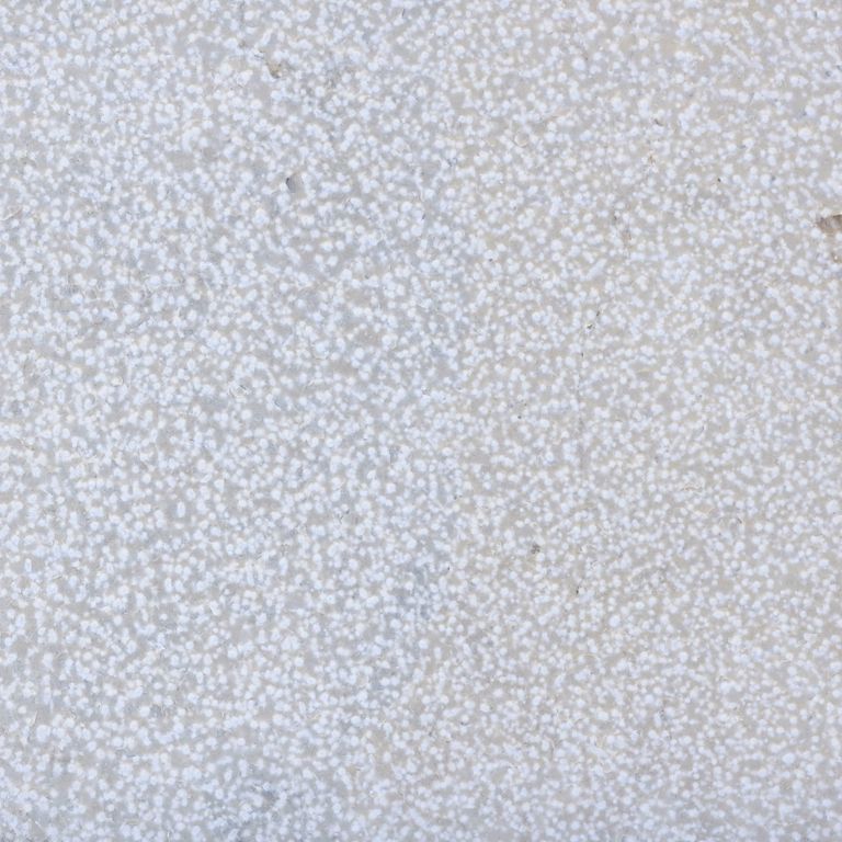 Color/Finish variation image for Valamaza Limestone. The surface finishes shown are brushed and bush hammered. Dominant colors shown are gray and white; with beige, blue, pink and purple secondaries. The color mix creates a cool feeling. Speckled and coarse speckled color patterns.