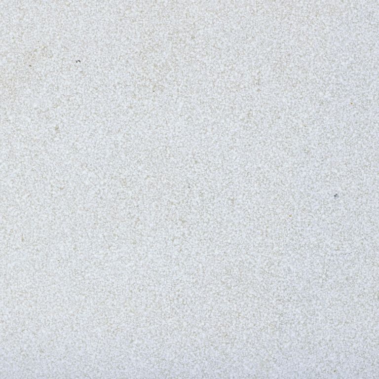 Best close-up image for Valamaza Limestone. The surface finish shown is a combination of brushed and sand blasted. Dominant colors shown are blue and gray; with beige, purple and white secondaries. The color mix creates a cool feeling. Cloudy color pattern. Contains mineral inclusions.