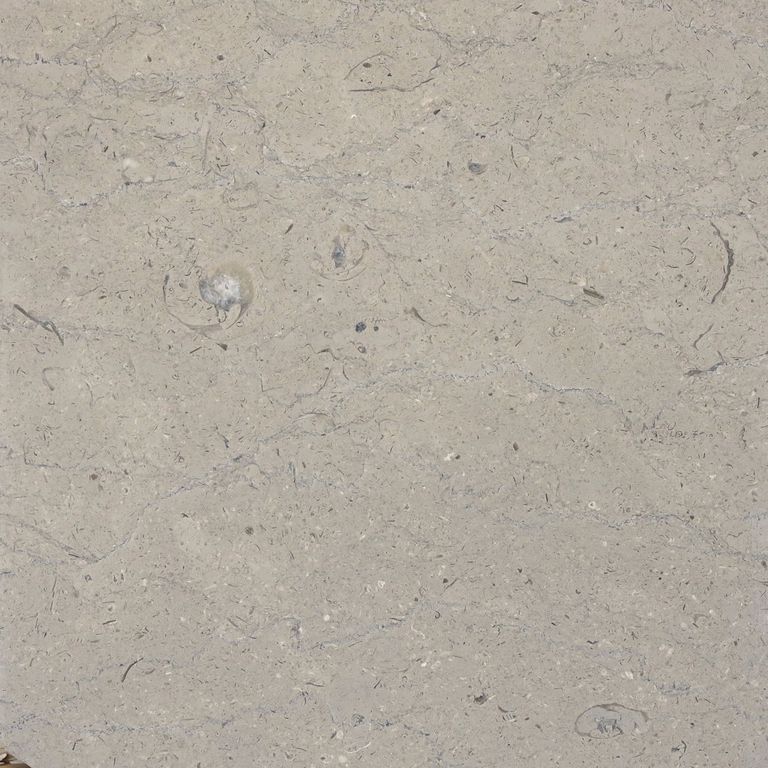 Color/Finish variation image for Sky Estrema Limestone. The surface finish shown is brushed. The dominant color shown is gray; with beige, blue, orange/rust, white and tan secondaries. Exhibits 