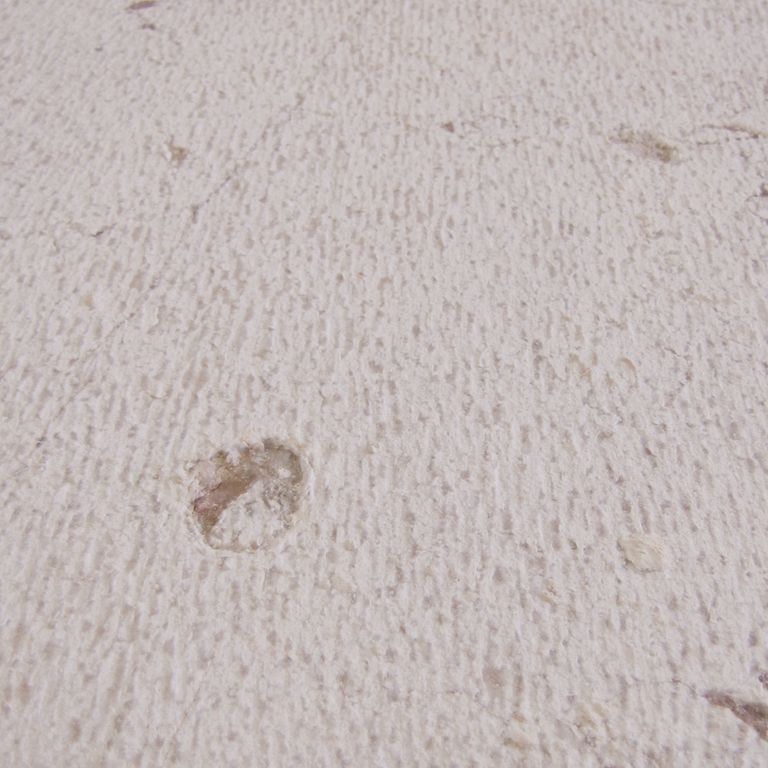 Color/Finish variation image for Limestone - Portuguese Liacado. The surface finish shown is chiseled. Dominant colors shown are beige, pink and purple; with pink, purple and white secondaries. Exhibits 