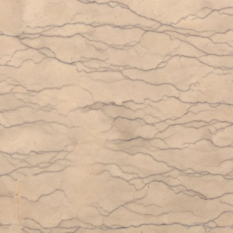 Close-up image for Liosin Limestone. The surface finish shown is honed. Dominant colors shown are beige, orange/rust and tan; with brown, pink and cream secondaries. Exhibits 