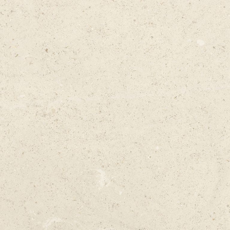 Best close-up image for Cremsar Limestone. The surface finish shown is honed. Dominant colors shown are beige and cream; with gray, white and tan secondaries. Exhibits 