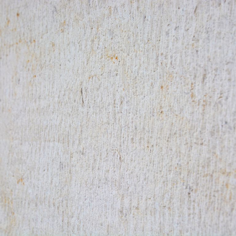 Color/Finish variation image for Cremcar Limestone. The surface finish shown is chiseled. Dominant colors shown are gray and white; with a beige secondary. Exhibits 
