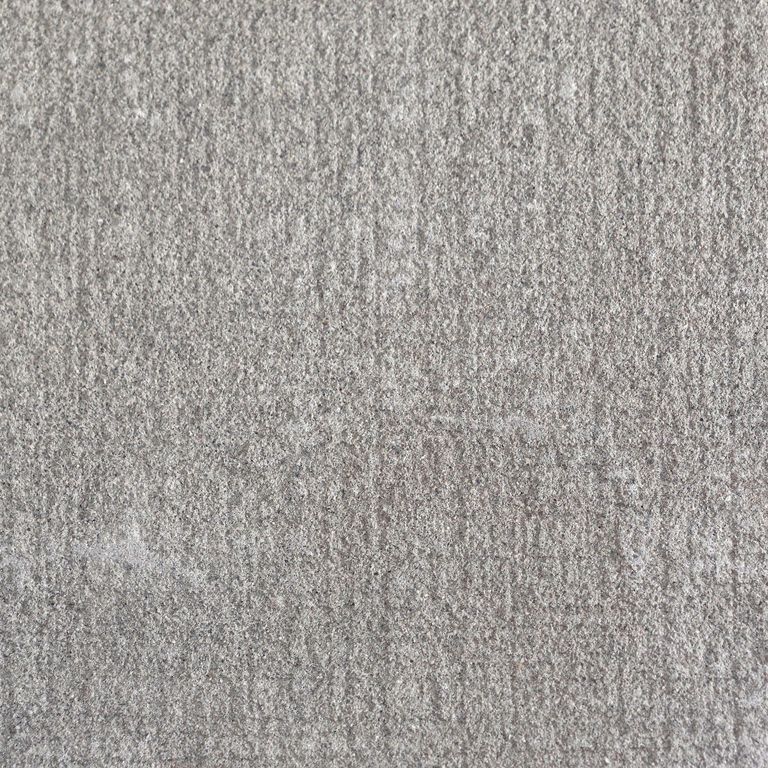 Color/Finish variation image for Italian Bluestone. The surface finish shown is canvas. The dominant color shown is gray; with brown, green, purple and white secondaries. Linear, fine speckled and cloudy color patterns.