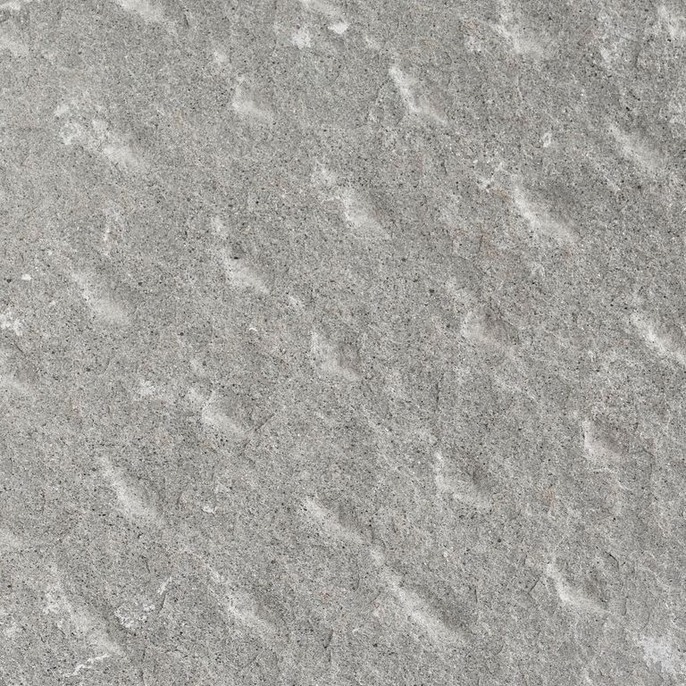 Color/Finish variation image for Italian Bluestone. The surface finish shown is pineapple. Dominant colors shown are green and gray; with brown and purple secondaries. Exhibits 