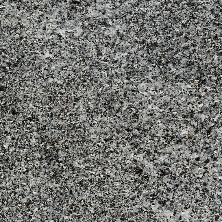Color/Finish variation image for Blue Crystal Granite. The surface finish shown is flamed. Dominant colors shown are black and gray; with green and white secondaries. Exhibits 