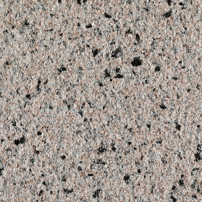 Feature image for Granite - Red Star. The surface finish shown is sand blasted. The dominant color shown is pink; with beige, black, brown, green, orange/rust, pink, purple, white, tan and cream secondaries. The color mix creates a warm feeling. Speckled and coarse speckled color patterns. Contains some mica and mineral inclusions.