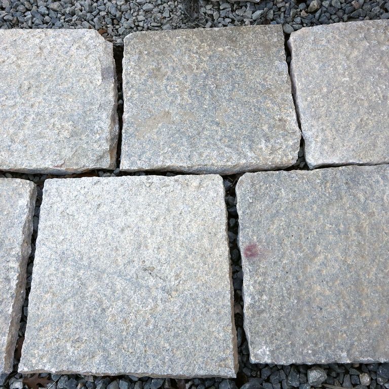 Application image for Granite - Reclaimed Square Pavers. The surface finish shown is . The dominant color shown is gray. The color mix creates a cool feeling. Regular and speckled color patterns.