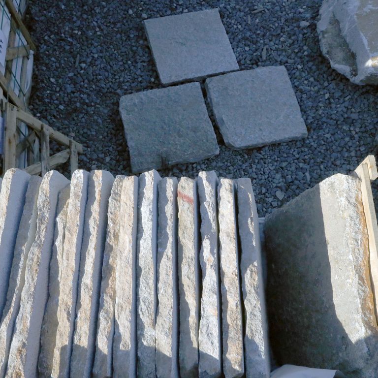 Application image for Granite - Reclaimed Square Pavers. The surface finish shown is . The dominant color shown is gray. The color mix creates a cool feeling.