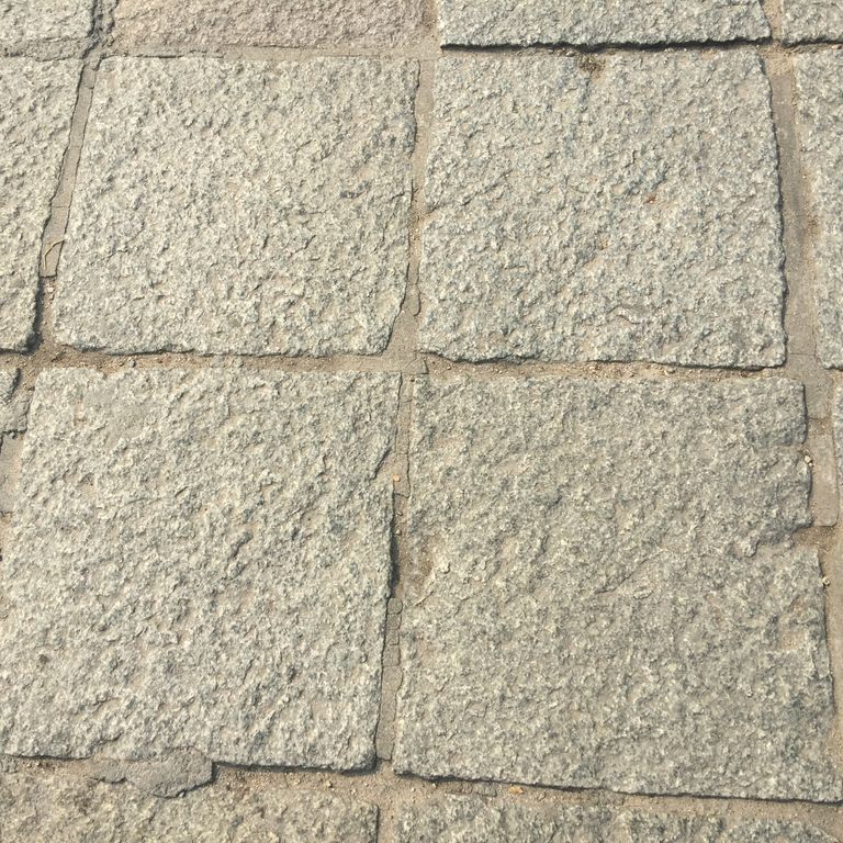 Application image for Granite - Reclaimed Square Pavers. The surface finish shown is . Dominant colors shown are beige, gray and tan. The color mix creates a warm feeling.