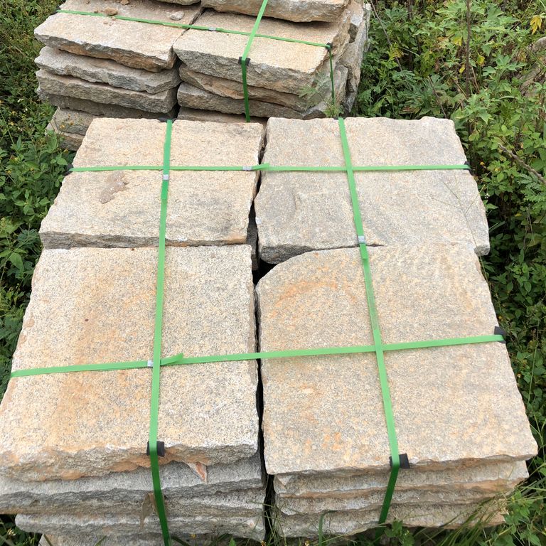 Application image for Granite - Reclaimed Square Pavers. The surface finish shown is . Dominant colors shown are beige and gray. The color mix creates a warm feeling.