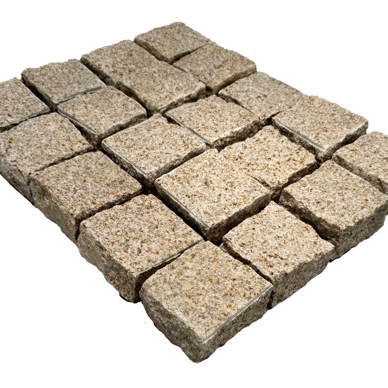Oblique image for Granite - Golden. The surface finish shown is split-face. The dominant color shown is tan. The color mix creates a warm feeling.
