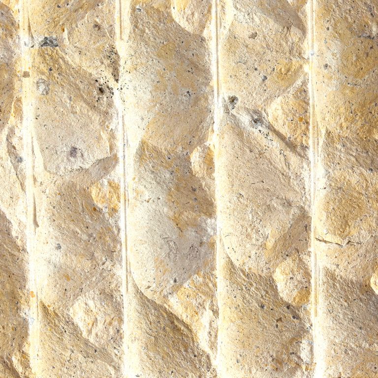 Color/Finish variation image for China Buff Sandstone. The surface finish shown is grooved. Dominant colors shown are beige, yellow, tan and cream; with orange/rust and white secondaries. Exhibits 
