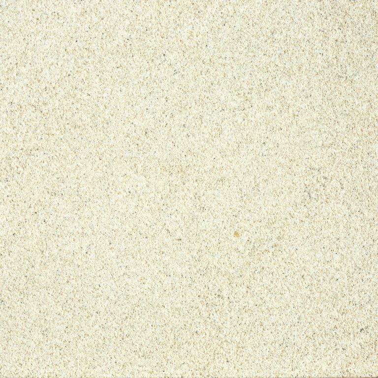 Close-up image for China Buff Sandstone. The surface finish shown is sand blasted. Dominant colors shown are beige and cream; with white and yellow secondaries. The color mix creates a warm feeling. Solid and fine speckled color patterns.