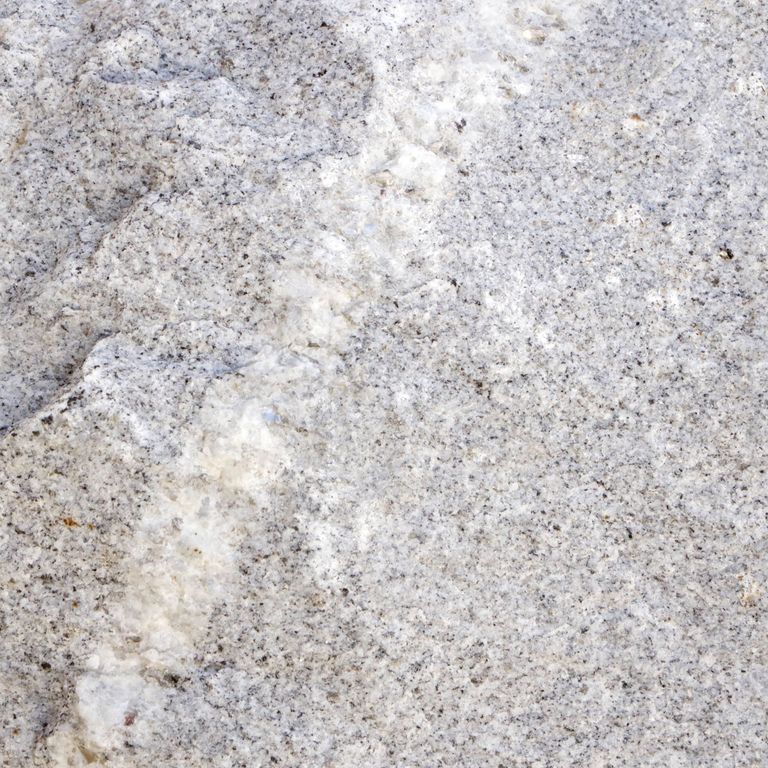 The surface finish shown is split-face. The dominant color shown is gray. The color mix creates a cool feeling. Random, speckled, coarse speckled and blotched color patterns.