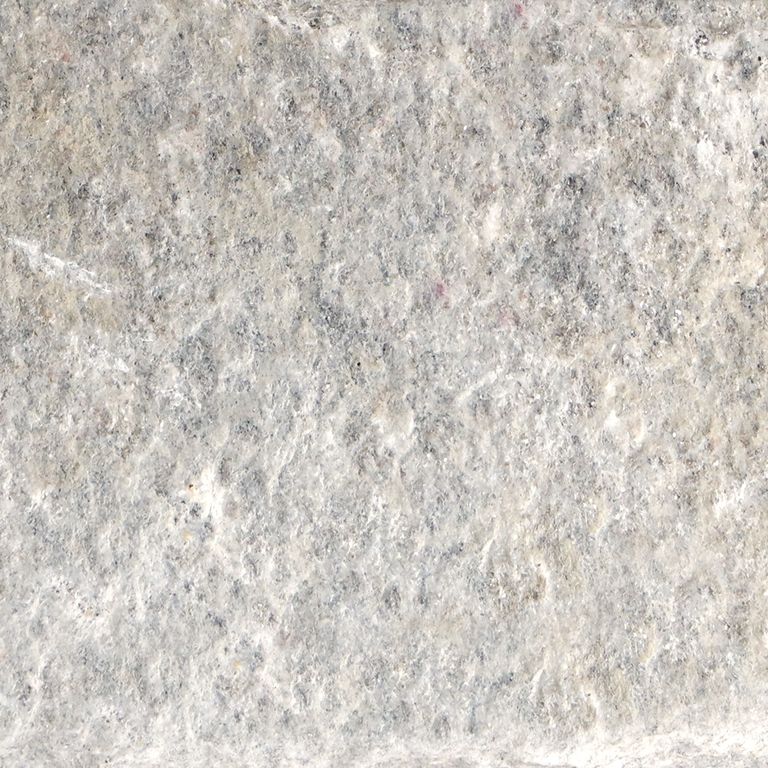 The surface finish shown is split-face. Dominant colors shown are beige and gray. The color mix creates a cool feeling. Random, speckled, coarse speckled and blotched color patterns.