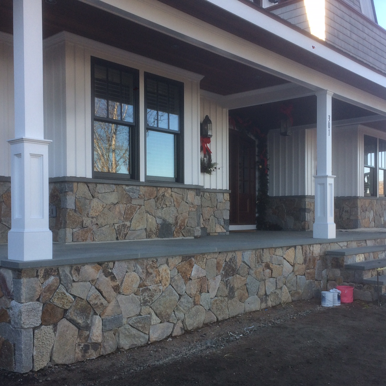 Application image for Granite - Colonial Tan. The image shows this material being used for full bed veneer and thin veneer.