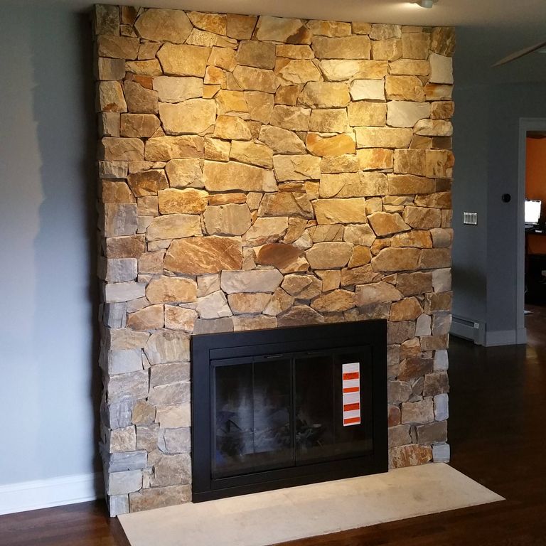 Application image for Granite - Colonial Tan. The image shows this material being used for thin veneer and interior cladding. The dominant color shown is brown. The color mix creates a warm feeling.