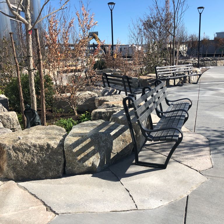 The image shows this material being used in a patio pavers application.