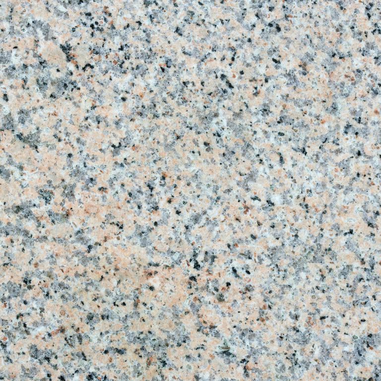 Color/Finish variation image for Granite - Millenium. The surface finish shown is polished. Dominant colors shown are blue and gray; with beige and cream secondaries. Speckled and blotched color patterns.