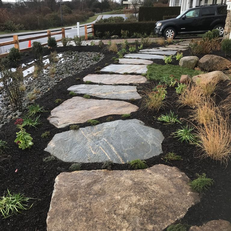 Application image for Granite - Black Mountain. The image shows this material being used in a path pavers application.