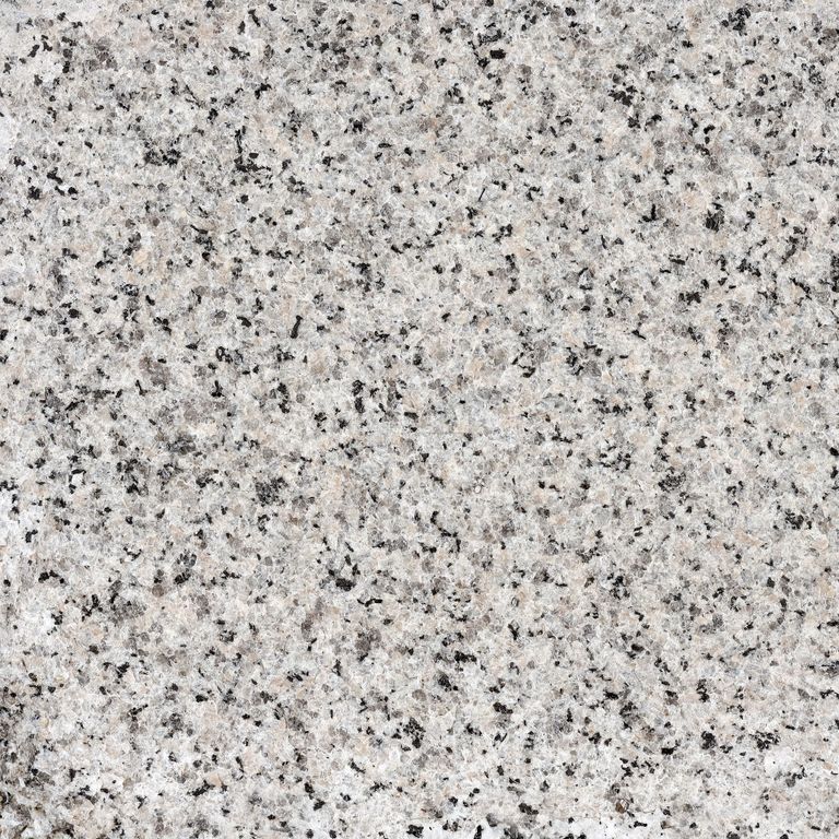 The surface finish shown is flamed. The dominant color shown is gray. The color mix creates a warm feeling. Coarse speckled color pattern.