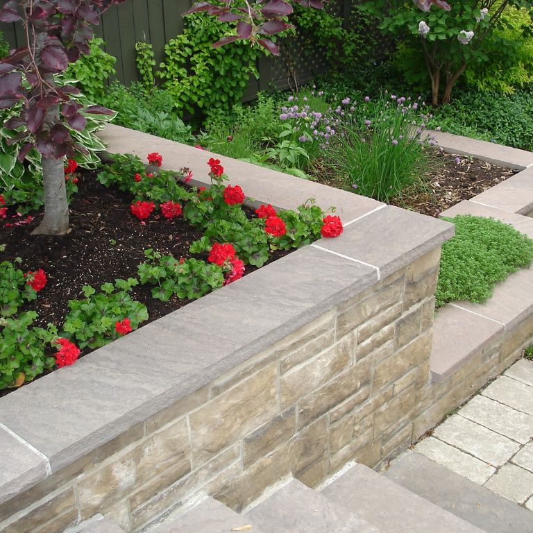 The image shows this material being used in a wallstone cap application.