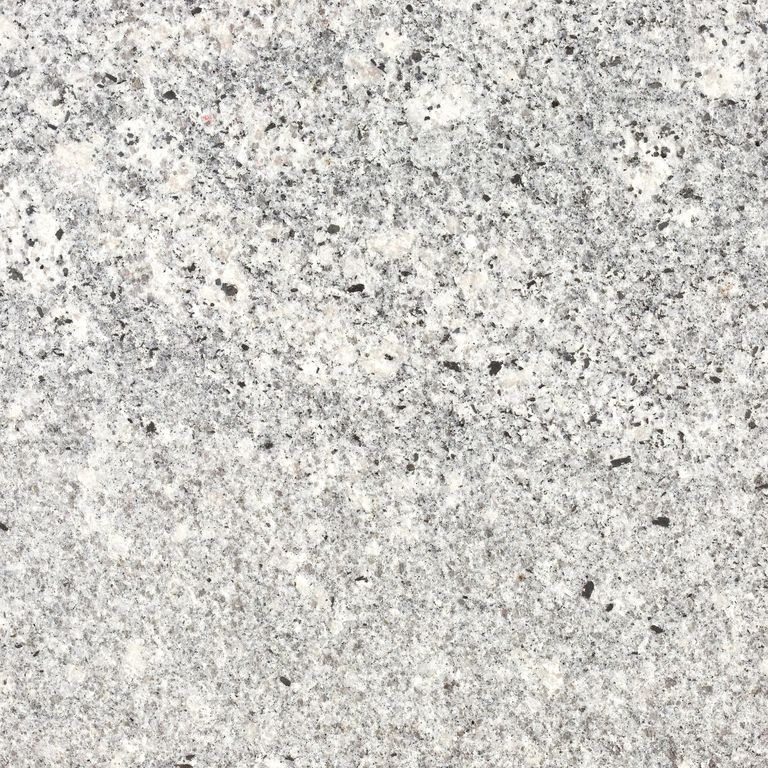 Feature image for Fancy Beige Granite. Dominant colors shown are gray and white; with beige and cream secondaries. The color mix creates a cool feeling. Speckled and blotched color patterns.