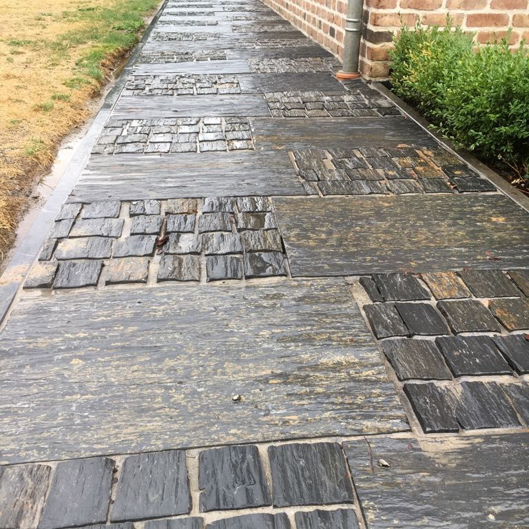 The image shows this material being used for path pavers and patio pavers.