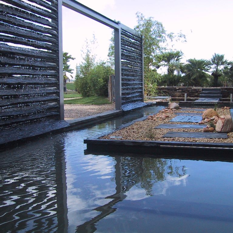 The image shows this material being used for pond border coping, full bed veneer and thin veneer.