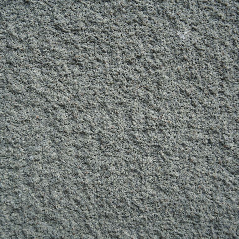 Color/Finish variation image for Ankar Gray Basalt. The surface finish shown is waterjet. Dominant colors shown are green and gray; with a blue secondary. The color mix creates a cool feeling. Speckled color pattern.