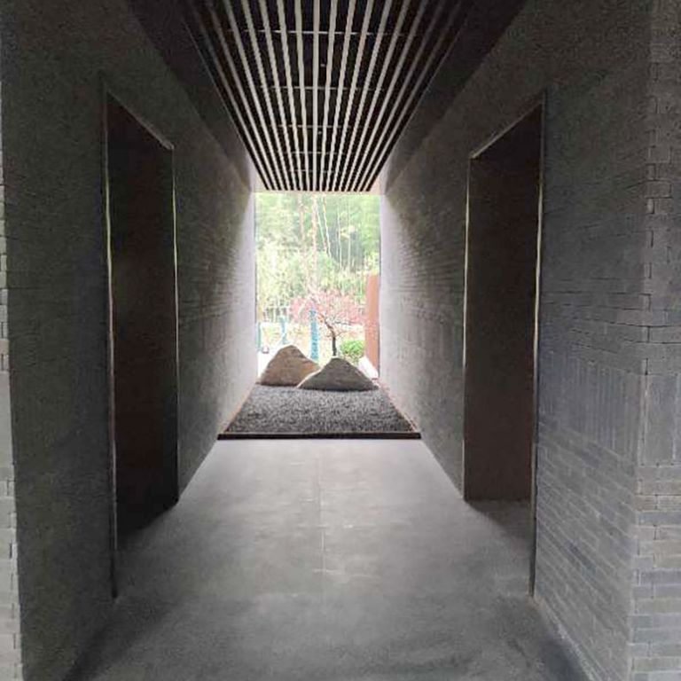 The image shows this material being used in an interior floor application.