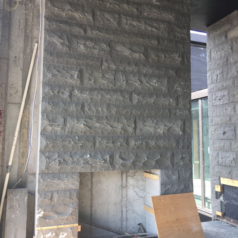 The image shows this material being used for fireplace surround, full bed veneer and thin veneer.