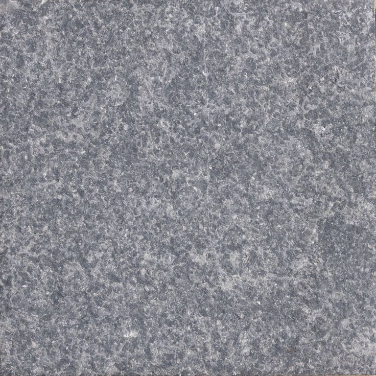 Color/Finish variation image for Limestone - Belgian Bluestone. The surface finish shown is flamed. The dominant color shown is gray. The color mix creates a cool feeling. Speckled and random color patterns.